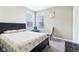 This bedroom features neutral walls, plush carpet, windows, and modern furniture at 14402 Wolverton Way, Fishers, IN 46037