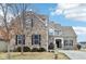 Charming two-story brick home with well-maintained lawn and inviting curb appeal at 14402 Wolverton Way, Fishers, IN 46037