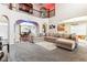 Spacious living room boasts vaulted ceilings and seamless flow to dining and kitchen areas at 14402 Wolverton Way, Fishers, IN 46037