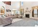Cozy living room with fireplace and high ceilings at 14402 Wolverton Way, Fishers, IN 46037