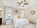 Serene main bedroom with soft lighting, decorative wallpaper, and a plush king-size bed at 16613 Grappa Trl, Fishers, IN 46037