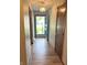 Home entryway featuring attractive wood-look flooring and bright blue door at 1701 Beech N Dr, Plainfield, IN 46168