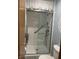 Modern bathroom showcasing a newly renovated glass-enclosed shower with accessible grab bars at 1701 Beech N Dr, Plainfield, IN 46168