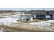 Aerial view of a home's backyard overlooking a pond, playground and other houses in the neighborhood at 20170 Edwick Dr, Westfield, IN 46074