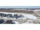 Aerial view of snow covered neighborhood homes and landscape at 20170 Edwick Dr, Westfield, IN 46074