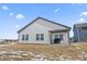 View of the property's backyard with a patio, perfect for outdoor dining and entertaining at 20170 Edwick Dr, Westfield, IN 46074