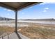 The view from the covered patio offers a serene and picturesque backdrop of the surrounding landscape at 20170 Edwick Dr, Westfield, IN 46074