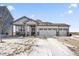 Charming single-story home featuring a two-car garage and welcoming front porch at 20170 Edwick Dr, Westfield, IN 46074