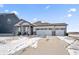 Inviting single-story home with a well-manicured lawn and attached two-car garage at 20170 Edwick Dr, Westfield, IN 46074