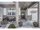 Welcoming front porch with cozy seating, decorative plants, and an inviting entrance at 20170 Edwick Dr, Westfield, IN 46074