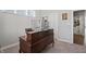 Another view of the well-lit home office highlighting desk, storage, and access to the walk-in closet at 20170 Edwick Dr, Westfield, IN 46074