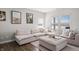 Inviting living room with a large comfortable couch and a bright, window-filled atmosphere at 20170 Edwick Dr, Westfield, IN 46074