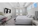 Bright primary bedroom with a tray ceiling, ample natural light, and a vanity area at 20170 Edwick Dr, Westfield, IN 46074