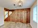 Living Room with a wood accent wall and light fixture at 205 S Market St, Thorntown, IN 46071