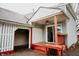 Covered patio with a ceiling fan and backyard access at 205 S Market St, Thorntown, IN 46071
