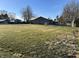 Backyard with lawn, trees, fencing, and shed at 2129 Heather Rd, Anderson, IN 46012