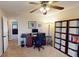 Bedroom featuring carpet flooring, wooden hutch, and a black office chair and desk at 2129 Heather Rd, Anderson, IN 46012