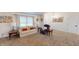 Cozy living room features a comfortable sofa, recliner and natural light from a window at 2129 Heather Rd, Anderson, IN 46012