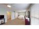 Airy main bedroom features a large window, dresser and stylish bedding at 2129 Heather Rd, Anderson, IN 46012