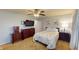 Nicely decorated main bedroom features flatscreen TV, dresser and stylish bedding at 2129 Heather Rd, Anderson, IN 46012