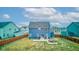 Well-maintained backyard with a patio, swing set, and seating area, perfect for outdoor relaxation and entertainment at 2627 Chalbury Dr, Plainfield, IN 46168