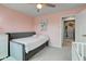 Charming bedroom with carpet, a bed, and two windows providing natural light at 2627 Chalbury Dr, Plainfield, IN 46168