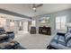 Bright and airy living room features plush seating and an open-concept design at 2627 Chalbury Dr, Plainfield, IN 46168