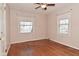 Bedroom featuring two windows that provide natural light and hardwood floors for a classic look at 3533 N Grant Ave, Indianapolis, IN 46218