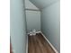 Walk-in closet featuring wood-look floors, light-blue walls, with a rod and shelf at 3533 N Grant Ave, Indianapolis, IN 46218