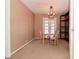 Eat-in dining room with table for four, and a light fixture to add warmth at 3533 N Grant Ave, Indianapolis, IN 46218