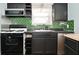 Efficient kitchen with stainless steel appliances, including oven, microwave and dishwasher at 3533 N Grant Ave, Indianapolis, IN 46218