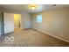 Bedroom featuring neutral walls and a window at 3656 Allison Ave, Indianapolis, IN 46224