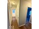 Hallway with multiple doors leading to other rooms in the home at 3656 Allison Ave, Indianapolis, IN 46224