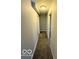 Hallway featuring neutral walls and carpet at 3656 Allison Ave, Indianapolis, IN 46224