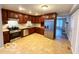 Well-equipped kitchen with stainless steel appliances, ample cabinetry, and modern lighting for a delightful culinary experience at 3656 Allison Ave, Indianapolis, IN 46224