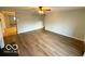 Spacious living room offers sleek floors, and neutral paint, creating a serene atmosphere at 3656 Allison Ave, Indianapolis, IN 46224