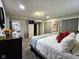 Bright bedroom with a cozy bed, soft carpet, and convenient closet at 498 Johnson Ave, Franklin, IN 46131
