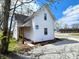 Charming two-story home featuring white siding, an inviting entrance and well-kept landscaping at 498 Johnson Ave, Franklin, IN 46131