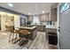 Well-equipped kitchen boasting granite countertops, stainless steel appliances, and a stylish center island at 498 Johnson Ave, Franklin, IN 46131