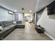 Inviting living area with a large sofa, neutral color scheme, and ample natural light at 498 Johnson Ave, Franklin, IN 46131