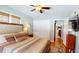 This bedroom features hardwood floors, neutral paint and closet at 717 Washington Ct, Anderson, IN 46011