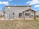 Backyard featuring a wooden pergola, garden, grass, and the home's exterior at 878 Hollowood Ln, Avon, IN 46123