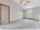 Spacious bedroom featuring vaulted ceilings, a ceiling fan, and neutral-colored walls at 878 Hollowood Ln, Avon, IN 46123