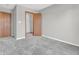 Bedroom features carpet, neutral wall color and access to walk-in closet at 878 Hollowood Ln, Avon, IN 46123