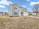 Two story home has nice landscaping with a two car garage and long driveway at 878 Hollowood Ln, Avon, IN 46123