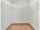 Walk-in closet with wood-look flooring and multiple wire shelving units at 878 Hollowood Ln, Avon, IN 46123