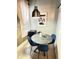 Small dining area featuring a round table, 4 blue chairs, and a light at 929 W Roache St, Indianapolis, IN 46208