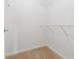 Organized closet with built-in shelving, maximizing storage and providing easy access to belongings at 9820 Legends Creek Dr # 103, Indianapolis, IN 46229