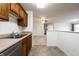 Open concept kitchen that offers seamless flow into the living area, perfect for entertaining at 9820 Legends Creek Dr # 103, Indianapolis, IN 46229