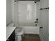 Bright bathroom showcases a new tub with white subway tile surround and matte black fixtures at 124 1St. Se Ave, Carmel, IN 46032